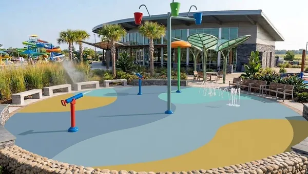 Commercial splash pad with colorful TPV rubber safety surfacing