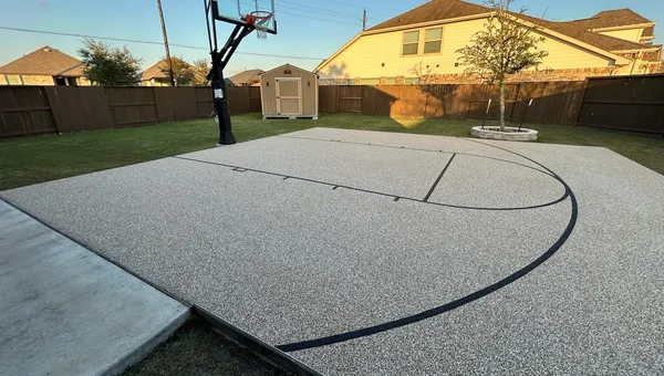 Commercial pool deck amenity area finished with TPV rubber surfacing